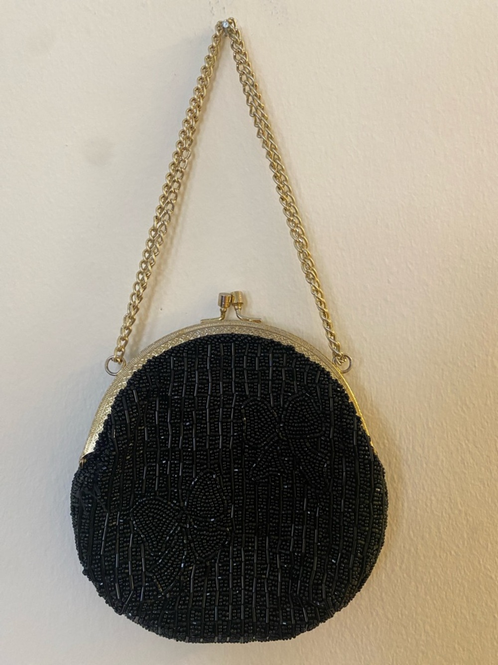 Black Beaded Clutch with Metallic Chain and Bow Design